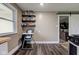 Kitchen includes shelving to maximize pantry storage space and a view into the adjoining room at 7764 S State Road 109, Markleville, IN 46056