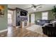 Cozy living room with plank flooring, neutral colors, and a comfortable seating area at 7764 S State Road 109, Markleville, IN 46056