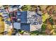 Overhead view of a home's roof, driveway, and yard, showcasing its design and landscaping in an established neighborhood at 8040 Lynch Ln, Indianapolis, IN 46250