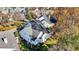 Aerial view of a house showcasing the roof, landscaping, and surrounding neighborhood at 8040 Lynch Ln, Indianapolis, IN 46250