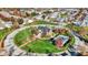 Community clubhouse featuring pool and common green space surrounded by homes in an attractive neighborhood at 8040 Lynch Ln, Indianapolis, IN 46250