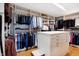 Large walk-in closet with custom shelving and ample storage space for clothing and accessories at 8040 Lynch Ln, Indianapolis, IN 46250