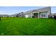 A fully fenced, lush backyard, with covered patio, perfect for entertaining or relaxing outdoors at 8160 Nik St, Brownsburg, IN 46112