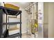 Utility room featuring furnace, water heater, and storage at 8160 Nik St, Brownsburg, IN 46112