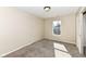 Bedroom with neutral paint, carpeting, and a window providing natural light at 8424 Nuckols Ln, Indianapolis, IN 46237