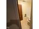 Bathroom with a shower-tub combination, toilet, and a linen closet at 914 Greenwood E Trl, Greenwood, IN 46142