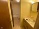 Bathroom view with shower-tub combo, vanity with mirror, and tiled floor at 914 Greenwood E Trl, Greenwood, IN 46142
