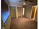 Cozy bedroom with ample natural light, built-in closet space, and neutral carpet creating a serene retreat at 914 Greenwood E Trl, Greenwood, IN 46142