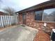 Back exterior brick wall, window and door at 914 Greenwood E Trl, Greenwood, IN 46142