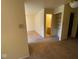 Spacious living area transitioning into a bathroom and bedroom, perfect for relaxation and easy living at 914 Greenwood E Trl, Greenwood, IN 46142