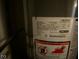 Close up view of the water heater and information sticker at 914 Greenwood E Trl, Greenwood, IN 46142