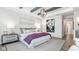 Serene primary bedroom with a plush bed, soft lighting, and tasteful decor at 9150 Bryce Cir, Zionsville, IN 46077