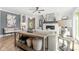 Stylish living room with a white brick fireplace, hardwood floors, and elegant decor throughout at 9150 Bryce Cir, Zionsville, IN 46077