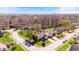 Aerial view of a residential neighborhood with mature trees and well-maintained homes at 923 Jonathan Dr, Plainfield, IN 46168