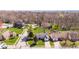 Well-maintained homes and mature trees create a peaceful residential area at 923 Jonathan Dr, Plainfield, IN 46168