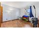 Bedroom with wood floors and natural light at 923 Jonathan Dr, Plainfield, IN 46168
