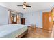 Bedroom with hardwood floors, walk in on-suite, and natural lighting at 923 Jonathan Dr, Plainfield, IN 46168