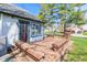 Back deck featuring built in seating at 923 Jonathan Dr, Plainfield, IN 46168