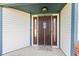 Inviting front entrance with a decorative door, sidelights, and a cozy welcome mat at 923 Jonathan Dr, Plainfield, IN 46168