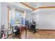 Bright office space with large windows and wood floors at 923 Jonathan Dr, Plainfield, IN 46168