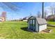 Backyard shed on a well kept lawn at 923 Jonathan Dr, Plainfield, IN 46168