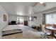 Cozy bedroom with neutral colors and plenty of natural light at 947 E Bradbury Ave, Indianapolis, IN 46203