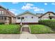 Charming single-story home with a well-maintained front yard and inviting curb appeal at 947 E Bradbury Ave, Indianapolis, IN 46203