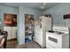 Bright kitchen with laminate floors and a pantry for extra storage space at 947 E Bradbury Ave, Indianapolis, IN 46203