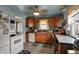 Efficient kitchen with tile backsplash, ample counter space, and stainless steel appliances at 947 E Bradbury Ave, Indianapolis, IN 46203