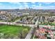 An aerial view captures the neighborhood's green spaces and proximity to the city, showcasing a blend of urban and suburban living at 947 E Bradbury Ave, Indianapolis, IN 46203