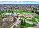 Aerial view of the park, featuring a well-maintained landscape, a modern-looking building, and pedestrian-friendly walkways at 947 E Bradbury Ave, Indianapolis, IN 46203