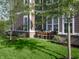 Charming backyard featuring a well-manicured lawn and patio dining, perfect for outdoor entertaining and relaxing at 998 Kinzer Ave, Carmel, IN 46032