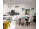Modern kitchen featuring white cabinetry, stainless steel appliances, and a spacious island at 998 Kinzer Ave, Carmel, IN 46032
