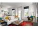Bright living room with white walls, modern decor, and comfortable seating at 998 Kinzer Ave, Carmel, IN 46032