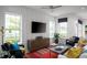 Stylish living room with ample natural light, modern furniture, and neutral tones at 998 Kinzer Ave, Carmel, IN 46032