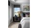 Tastefully decorated main bedroom featuring a modern black nightstand with gold accents and a stylish decor at 998 Kinzer Ave, Carmel, IN 46032