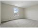 Bedroom features neutral walls, carpet and a window view at 10016 Jenna Ln, Indianapolis, IN 46239