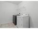 A laundry room with a washing machine and a dryer at 10016 Jenna Ln, Indianapolis, IN 46239