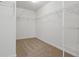 Spacious walk-in closet with shelving for optimal organization at 10016 Jenna Ln, Indianapolis, IN 46239