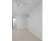 Bedroom featuring neutral carpet, a ceiling fan, and access to an adjoining room at 10109 Fergus Ave, Carmel, IN 46032