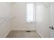 Walk-in closet with carpet and white wire shelving and a window at 10109 Fergus Ave, Carmel, IN 46032