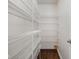 Walk-in pantry with ample shelving for organized storage, ensuring a clutter-free kitchen at 10109 Fergus Ave, Carmel, IN 46032