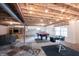 Basement featuring exposed ceiling, a pool table, seating, and a drum set at 10365 Aurora Ct, Fishers, IN 46038