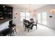 Cozy dining area with elegant lighting, ideal for Gathering meals and gatherings with friends at 10365 Aurora Ct, Fishers, IN 46038