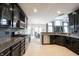 Modern kitchen with stainless steel appliances and granite countertops offers both style and functionality at 10365 Aurora Ct, Fishers, IN 46038