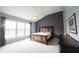 Spacious main bedroom featuring large windows and a vaulted ceiling with fan at 10365 Aurora Ct, Fishers, IN 46038