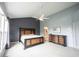 Main bedroom with ensuite, tray ceiling and large windows offering plentiful light at 10365 Aurora Ct, Fishers, IN 46038