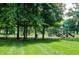A beautiful playground and open green lawn in the community at 10365 Aurora Ct, Fishers, IN 46038