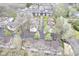 Overhead view of townhome community, showcasing mature trees and landscaped areas at 1127 Island Woods Dr # 56, Indianapolis, IN 46220
