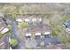 Overhead view of apartment community, showing mature trees, parking, and green spaces at 1127 Island Woods Dr # 56, Indianapolis, IN 46220
